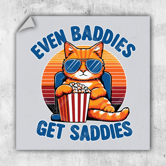 a sticker with a cat wearing sunglasses and eating popcorn