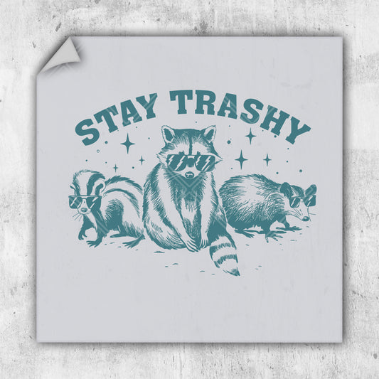 a sticker that says stay trashy with a picture of a raccoon