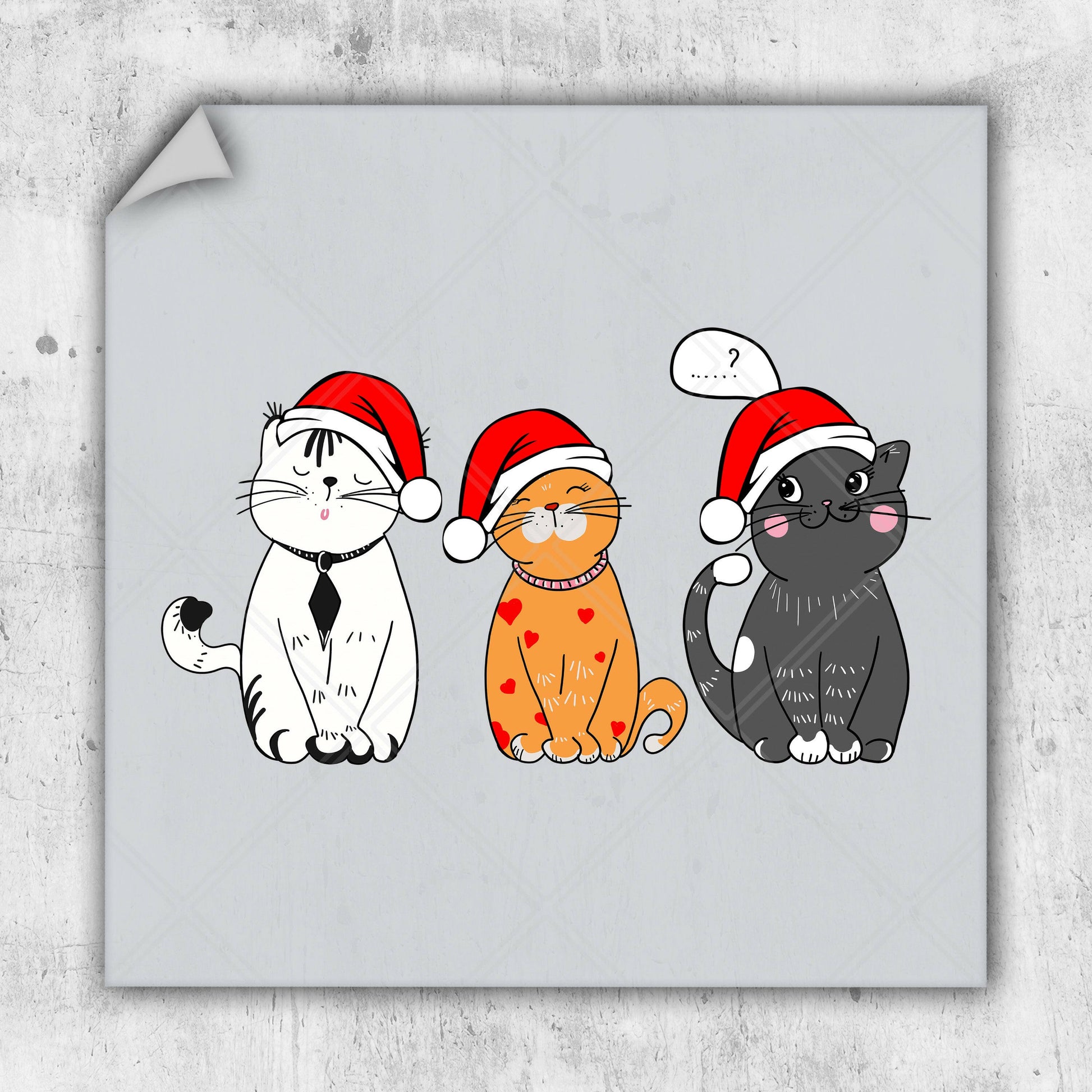 three cats wearing santa hats sitting next to each other