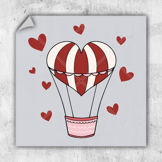 a picture of a hot air balloon with hearts