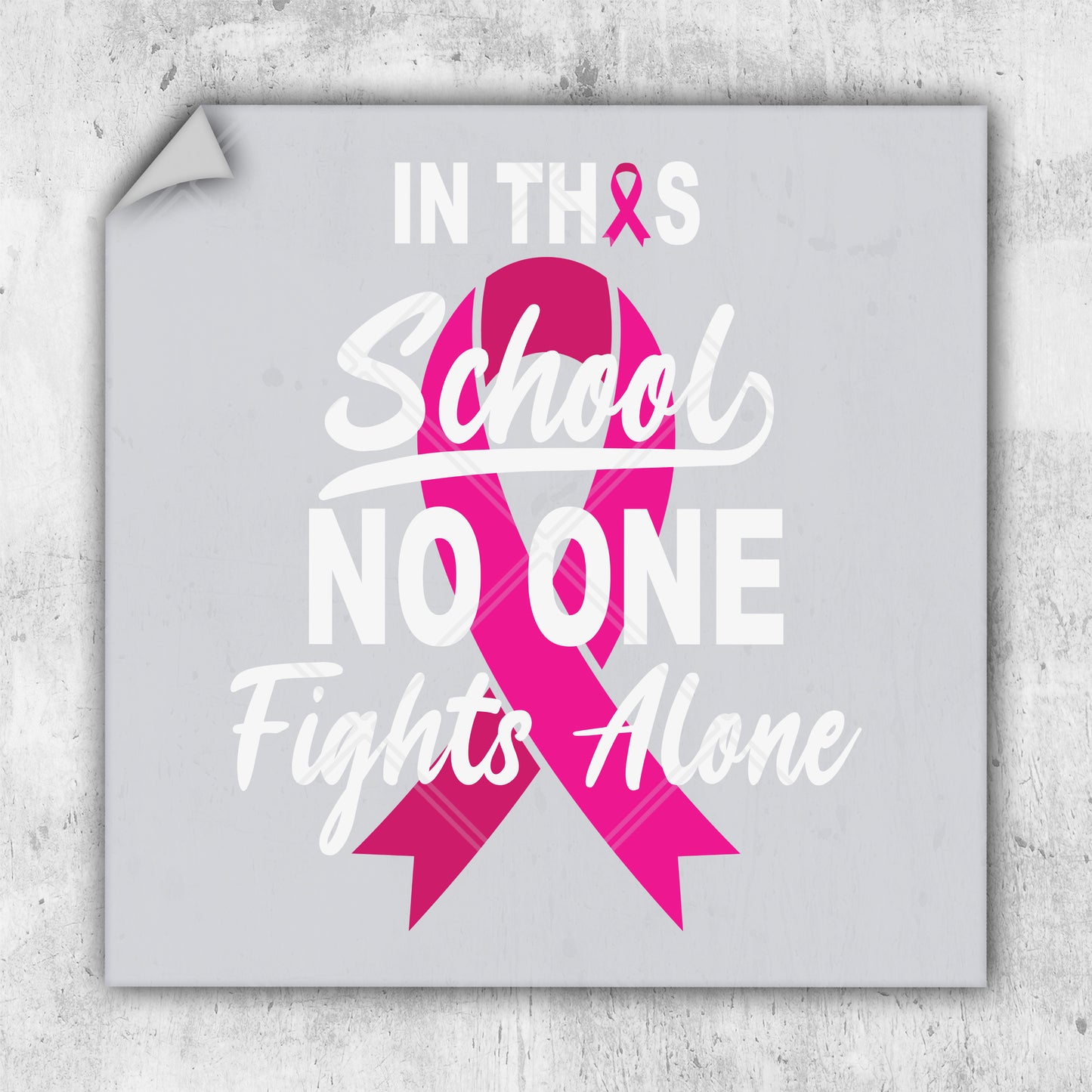 a pink ribbon with the words in this school no one fights alone