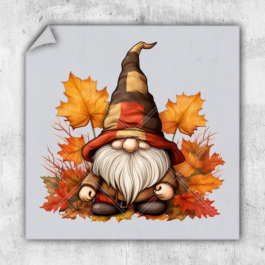 a picture of a gnome sitting on a pile of leaves