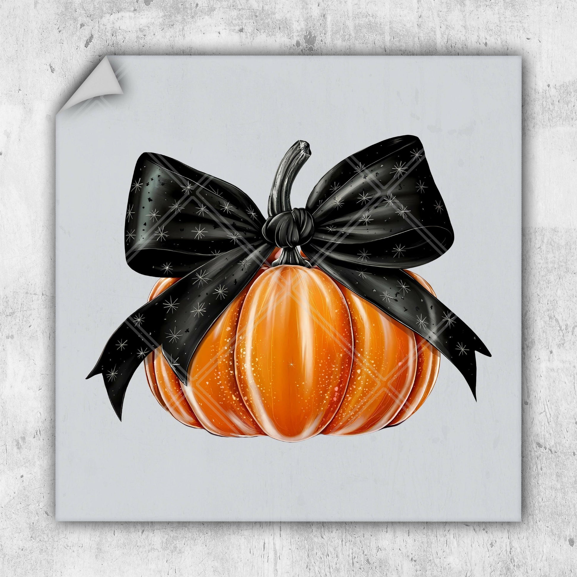 a picture of a pumpkin with a black bow