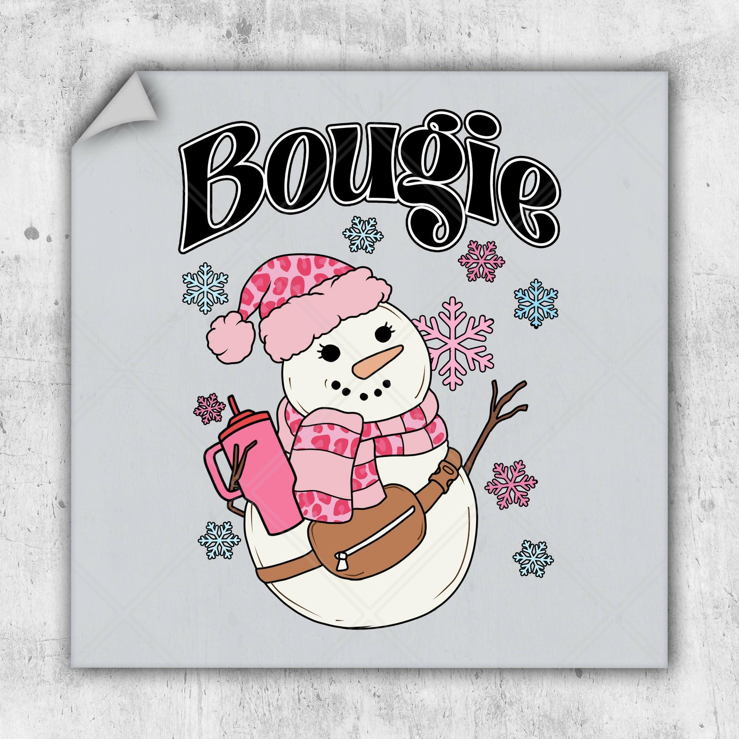 a snowman with a pink hat and scarf