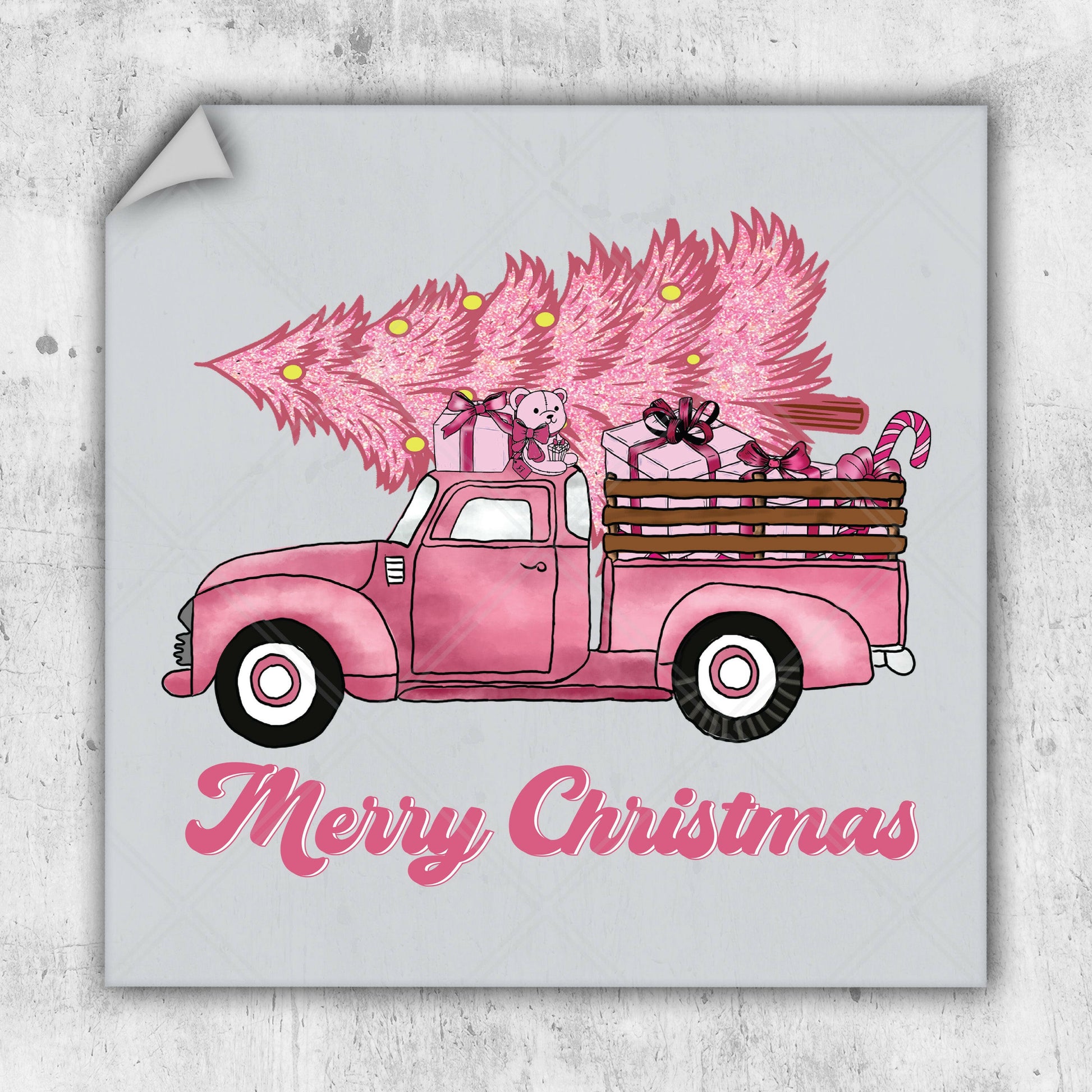 a pink truck with pink christmas trees in the back