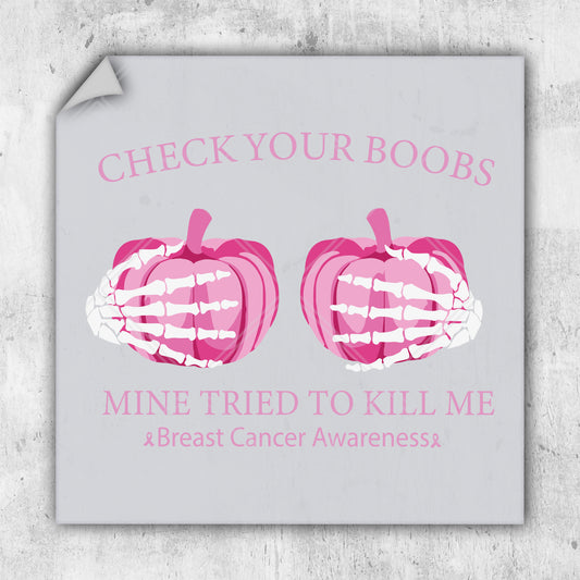 a sign with two pink pumpkins on it