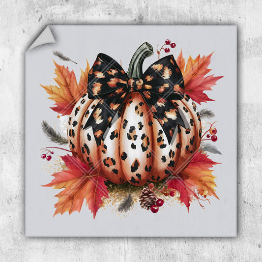 a painting of a pumpkin with a bow on it