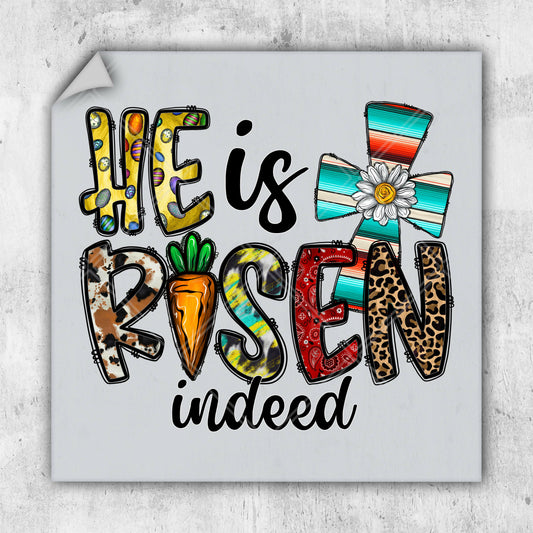 a sticker with the words he is risen under it