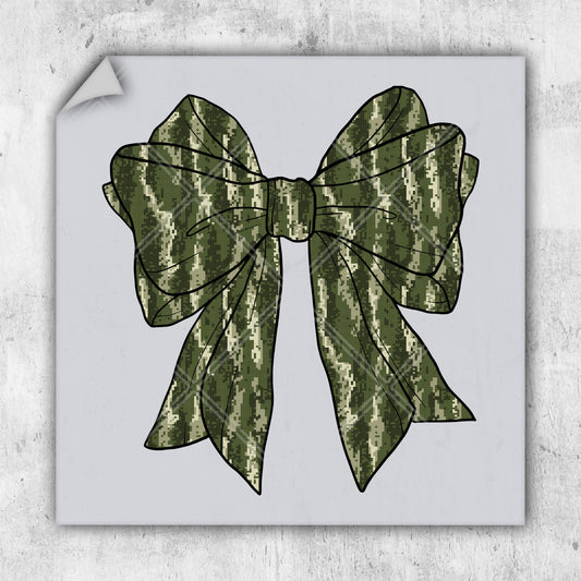 a picture of a green bow on a piece of paper