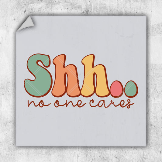 a sticker that says shh no one cares