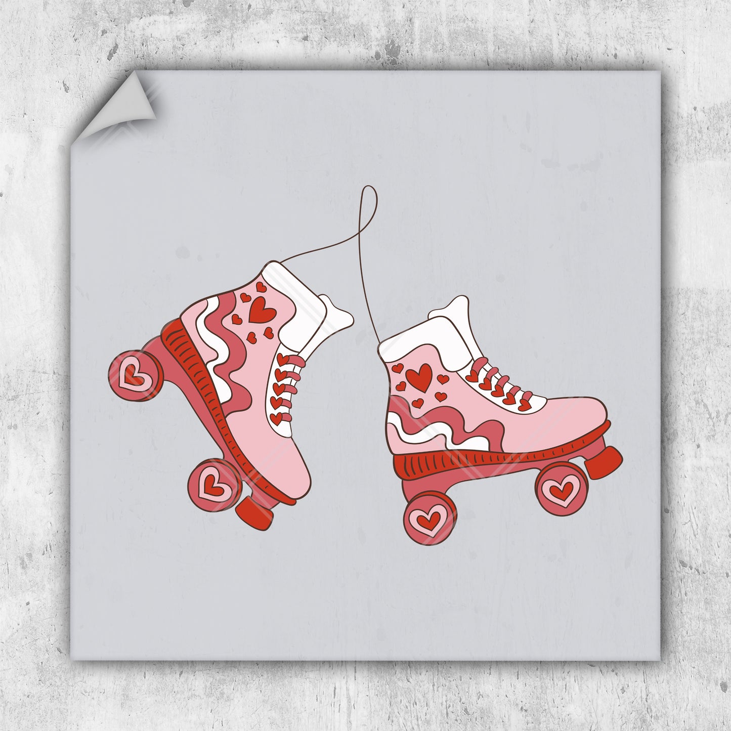 a pair of pink roller skates with hearts on them