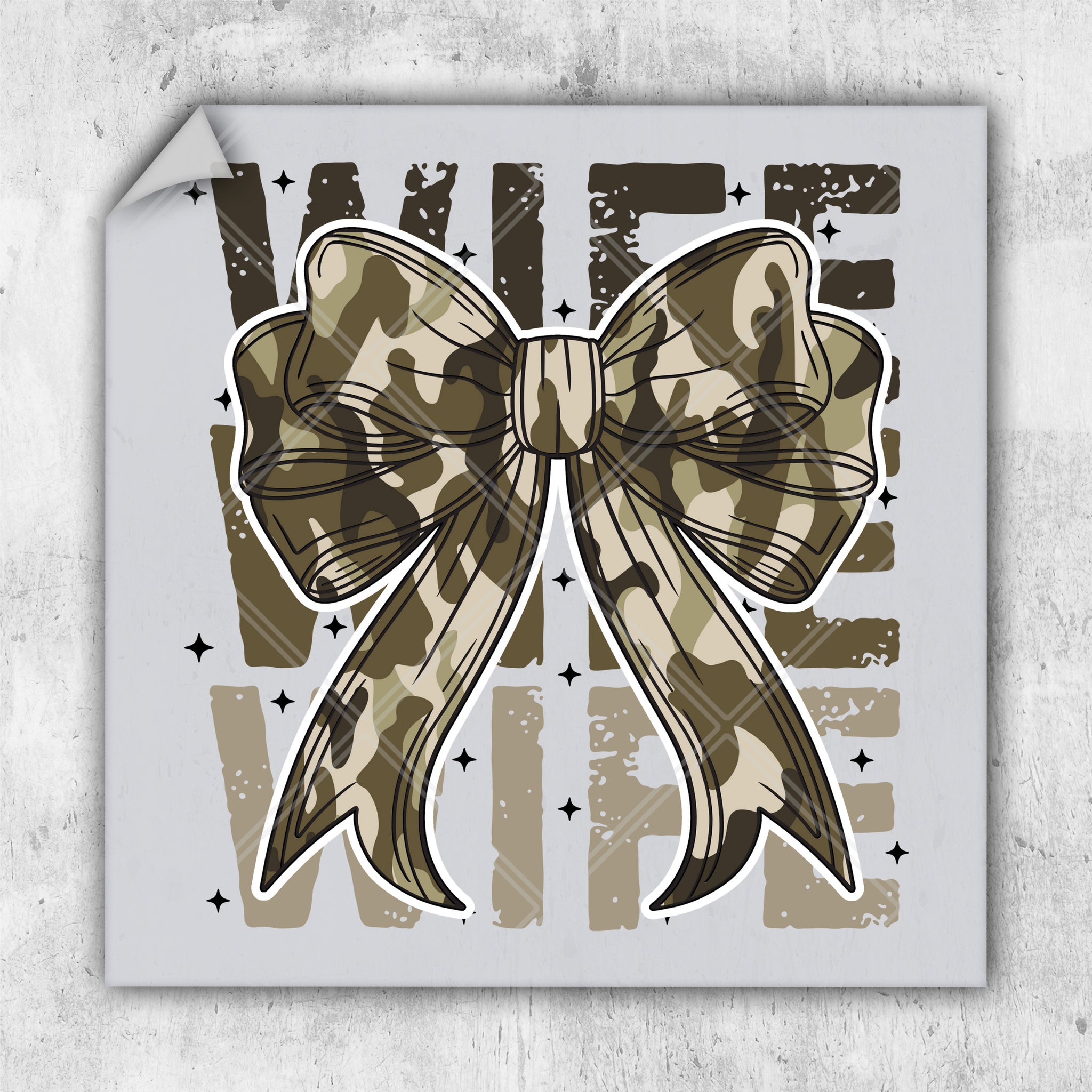 a sticker with a bow on it