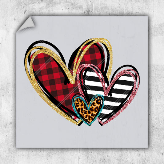 a picture of three hearts with a cheetah print on them