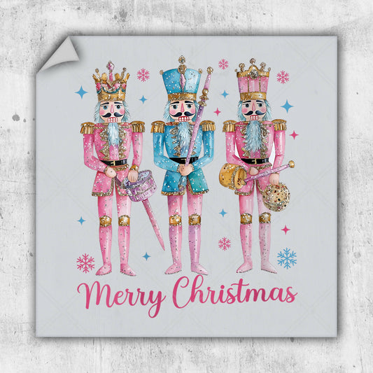 a merry christmas card with three nutcrackers