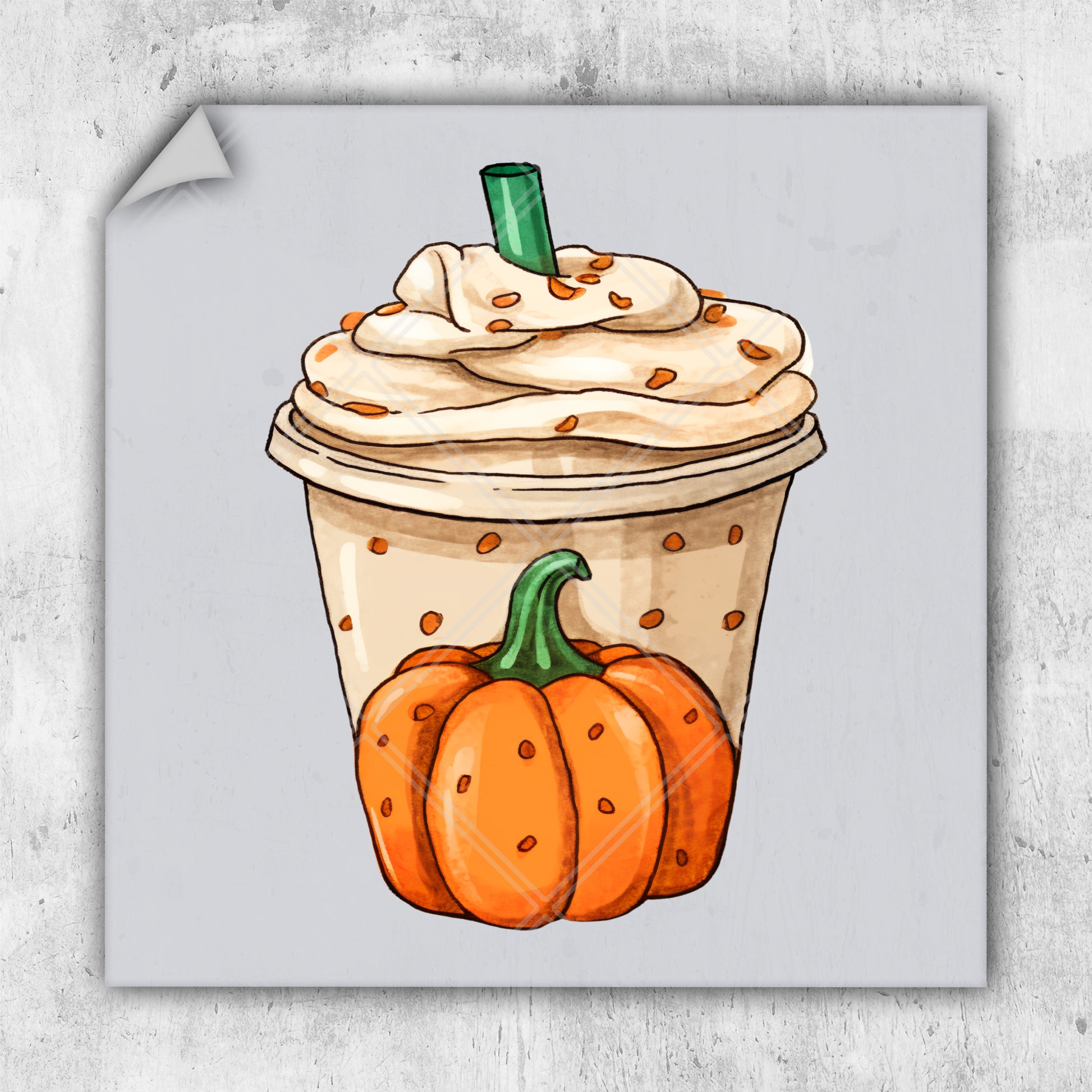 a cup of coffee with whipped cream and a pumpkin