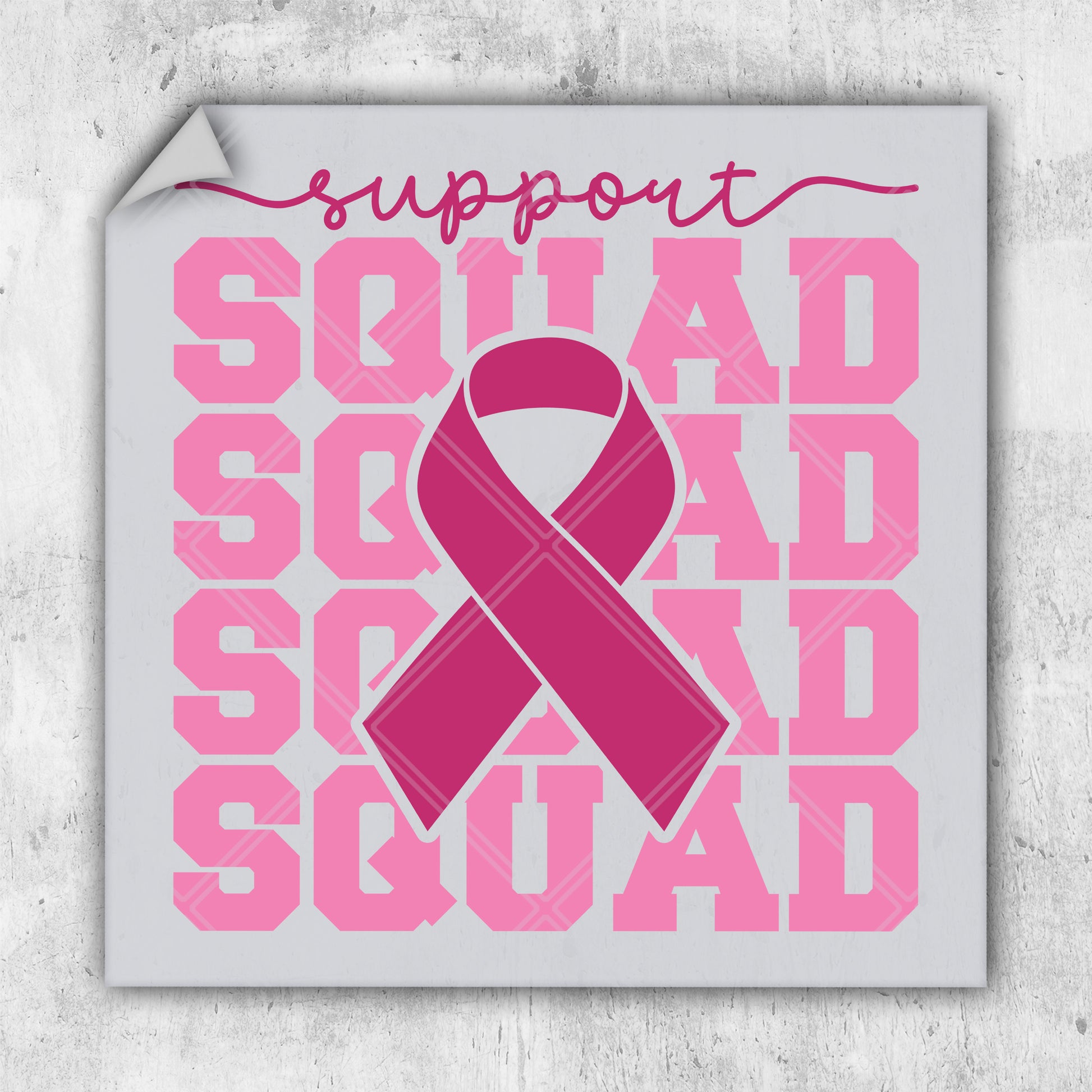 a square sticker with a pink ribbon on it