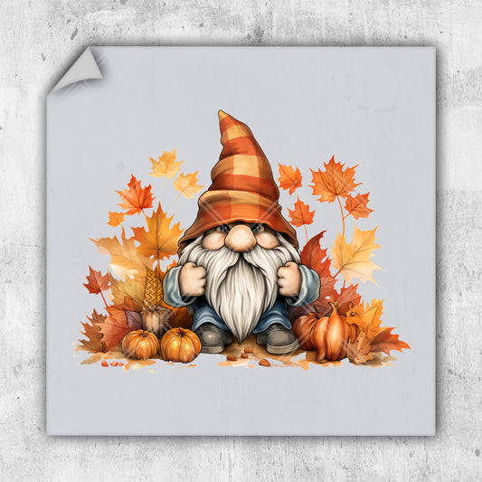 a picture of a gnome sitting on a pile of leaves