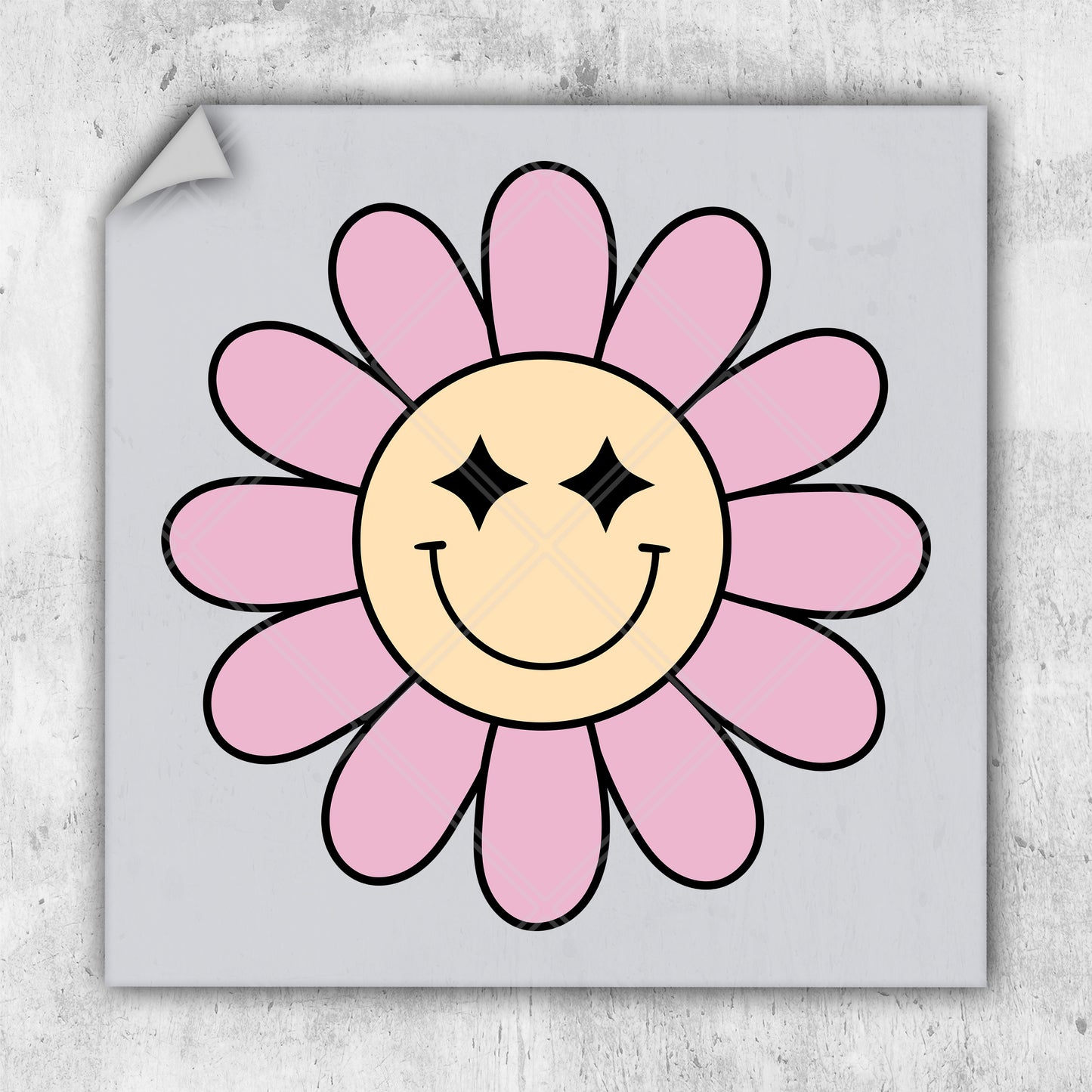 a pink flower with a smiley face drawn on it