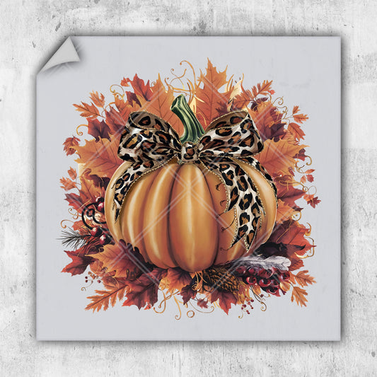 a picture of a pumpkin with a leopard print bow