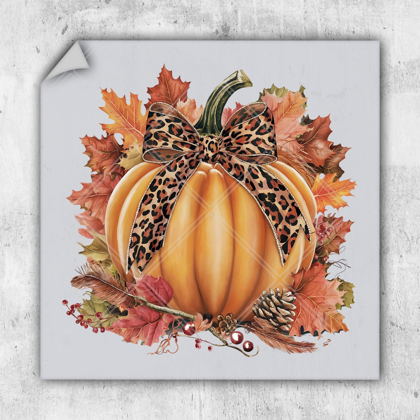 a picture of a pumpkin with a leopard print bow