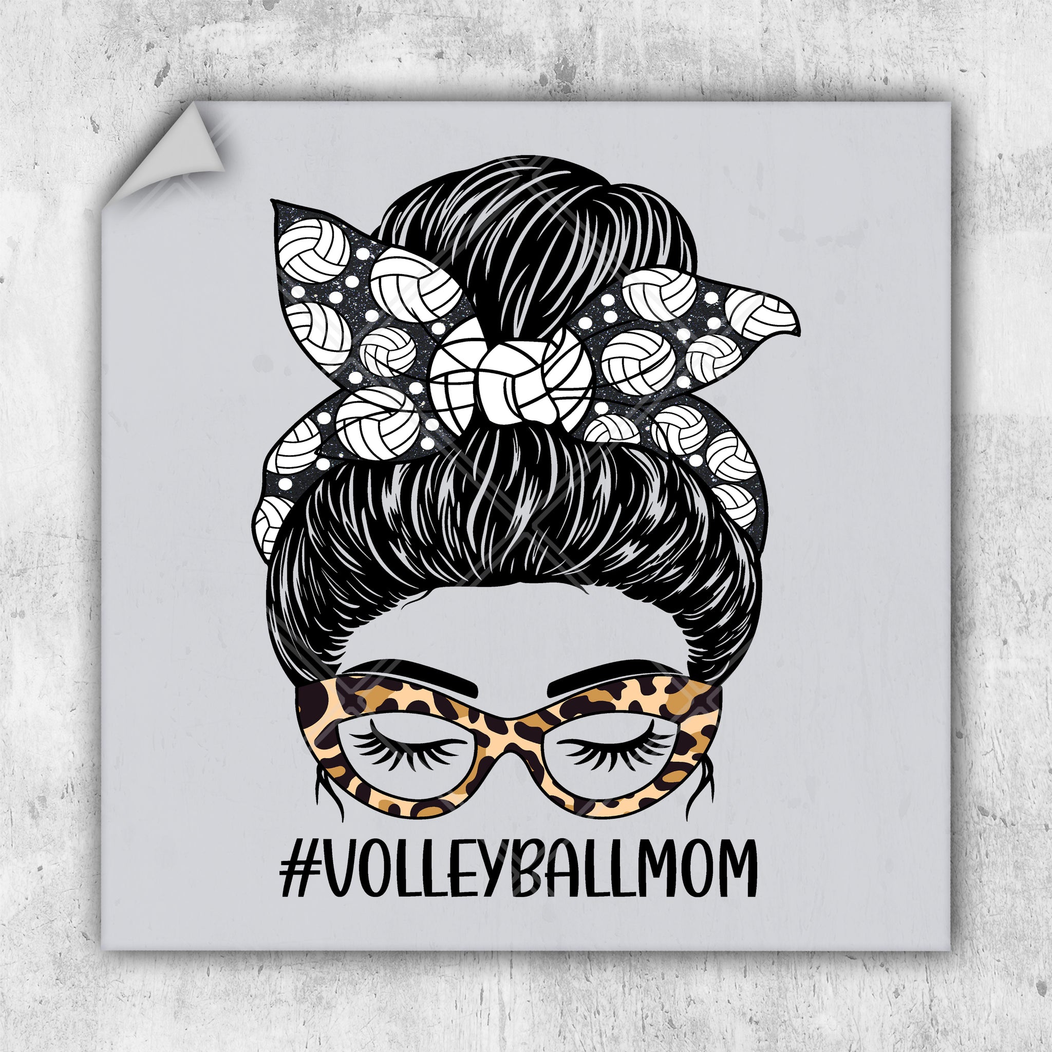 a sticker with a woman's hair and glasses on it