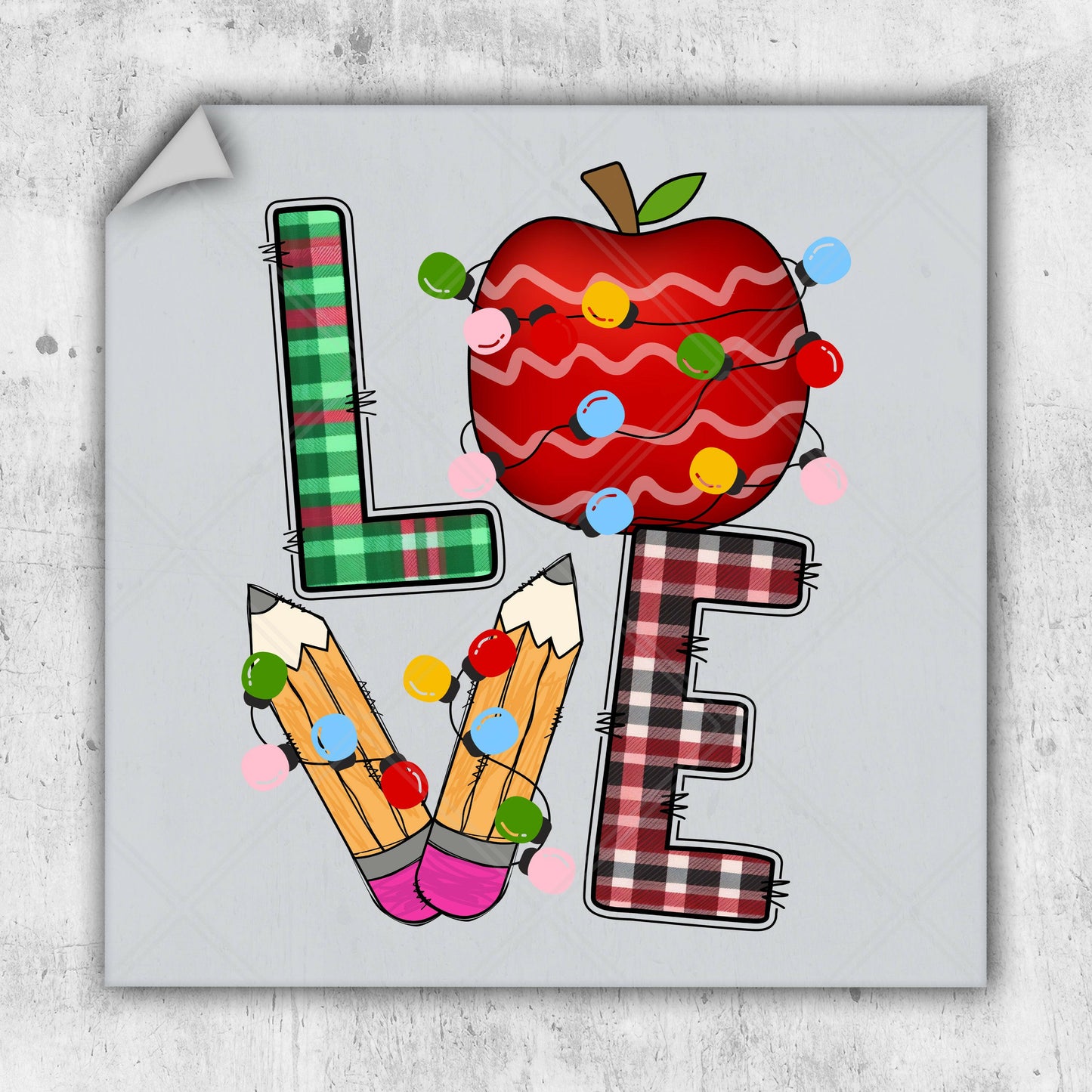 a picture of an apple and pencils in the shape of the word love