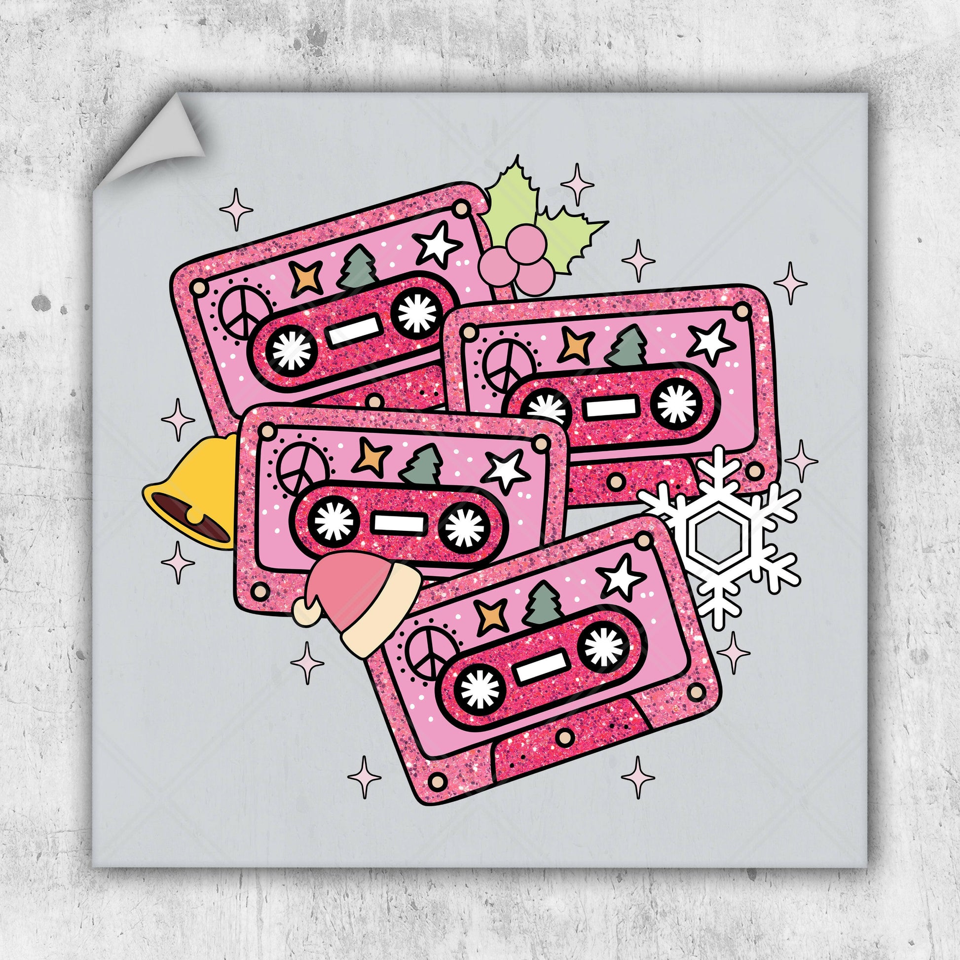 a pile of pink cassettes sitting on top of a table