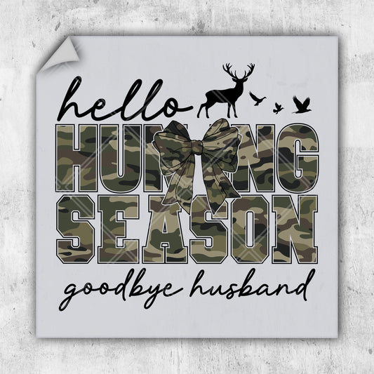 a white square sticker with a deer and the words hunting season on it