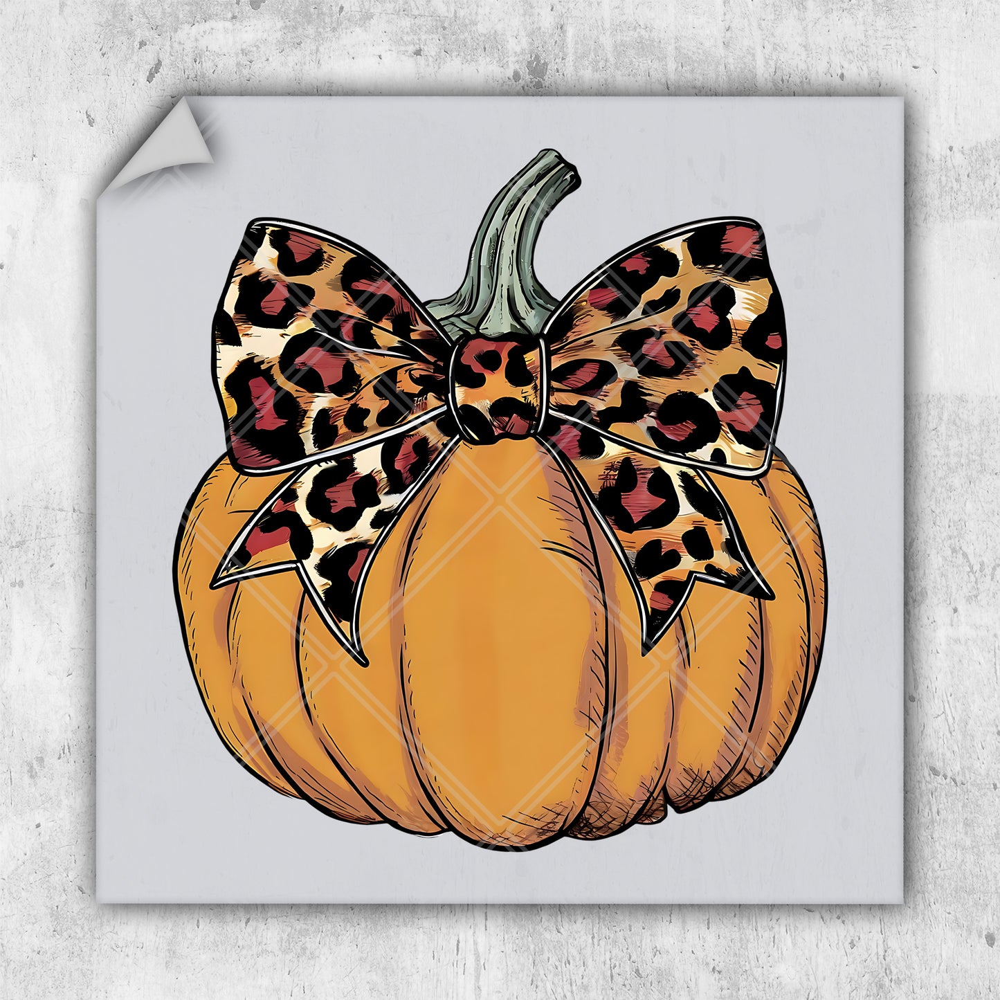 a picture of a pumpkin with a leopard print bow