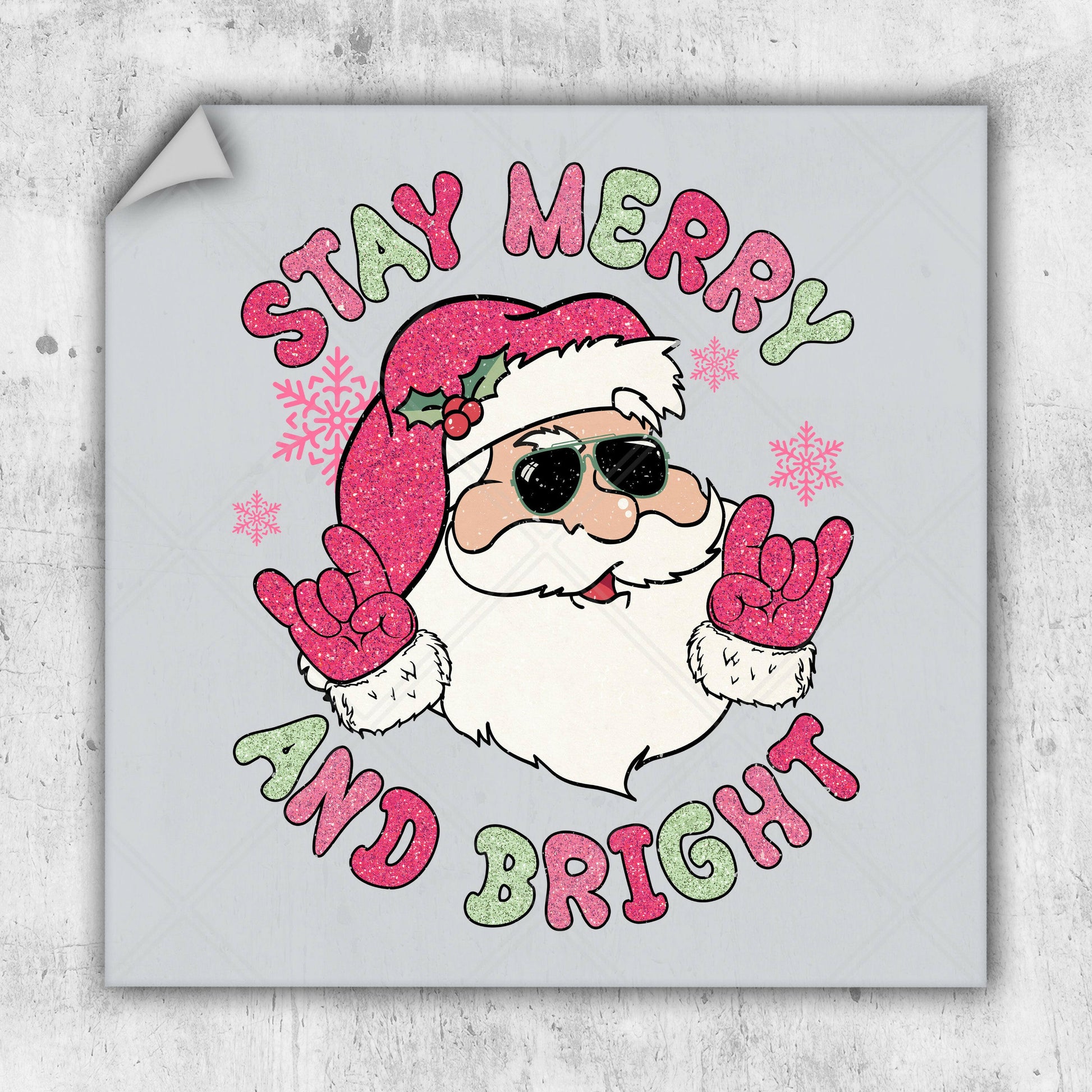 a sticker with a santa clause saying stay merry and bright