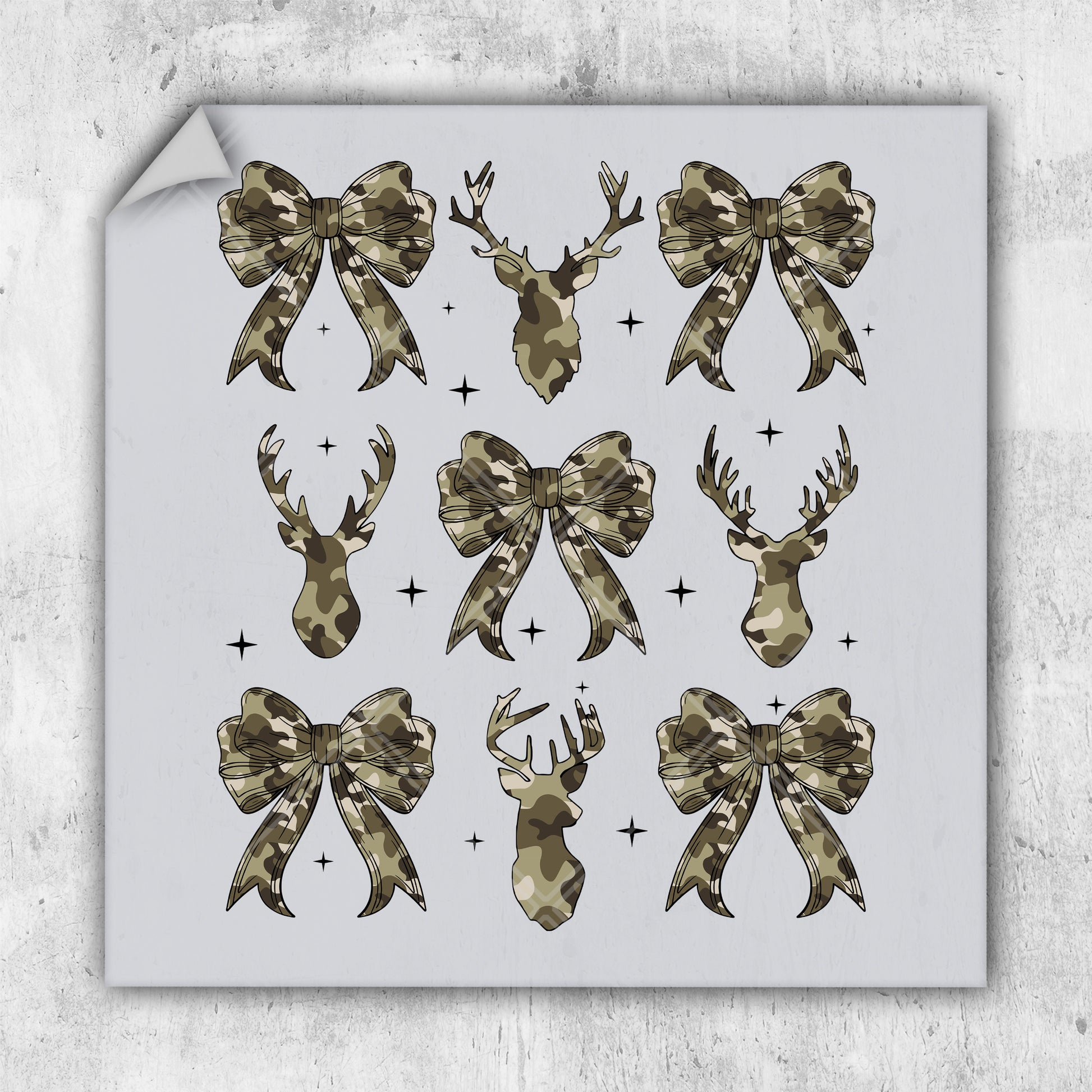 a sheet of paper with bows and deer heads on it