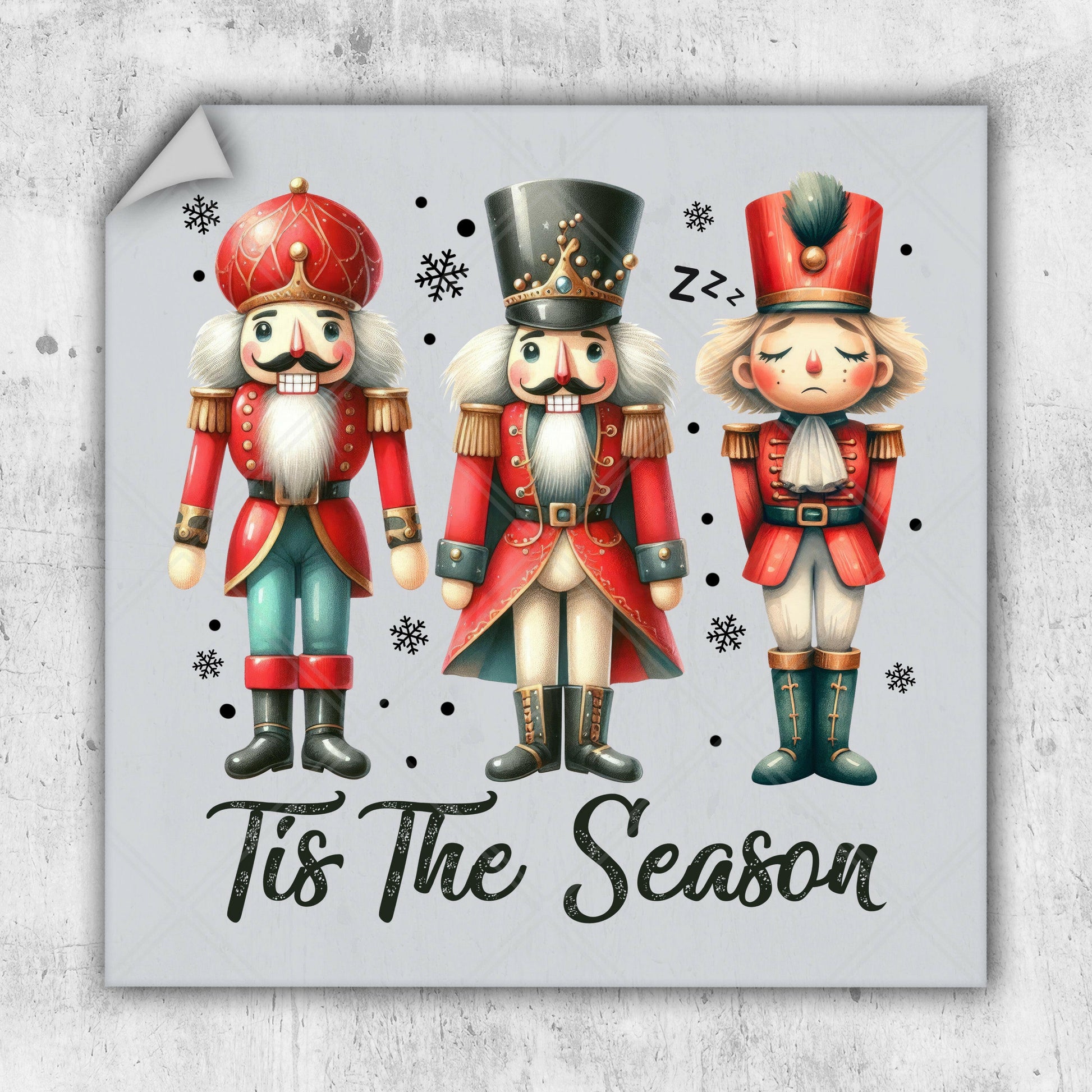 a christmas card with three nutcrackers and the words tis the season