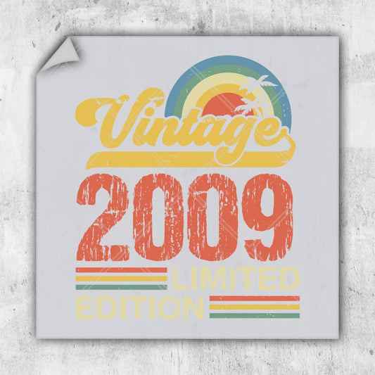 a white square sticker with the words vintage 2009 printed on it