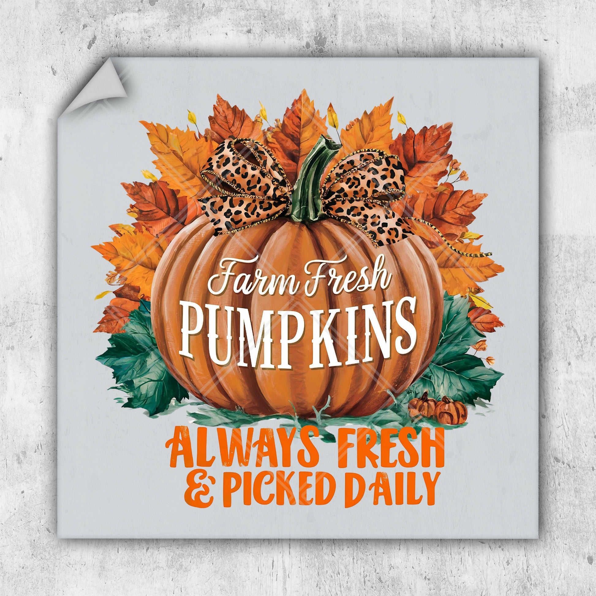 a sign with a pumpkin and leopard print on it