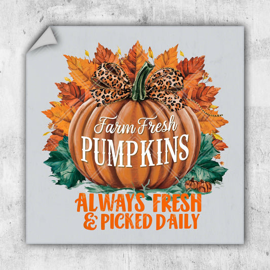 a sign with a pumpkin and leopard print on it