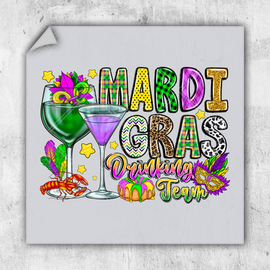 a picture of a mardi gras drink with a mardi gras theme