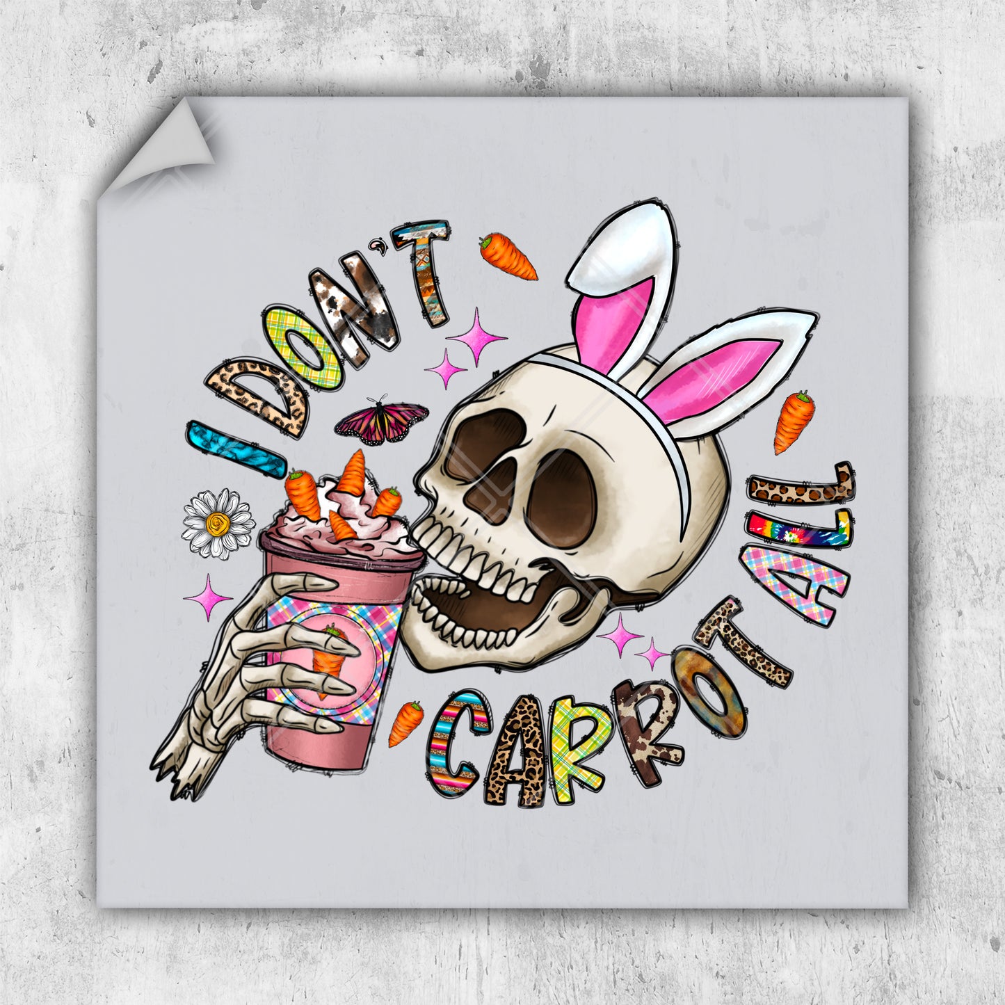 a sticker of a skull with a bunny's head and a cup of