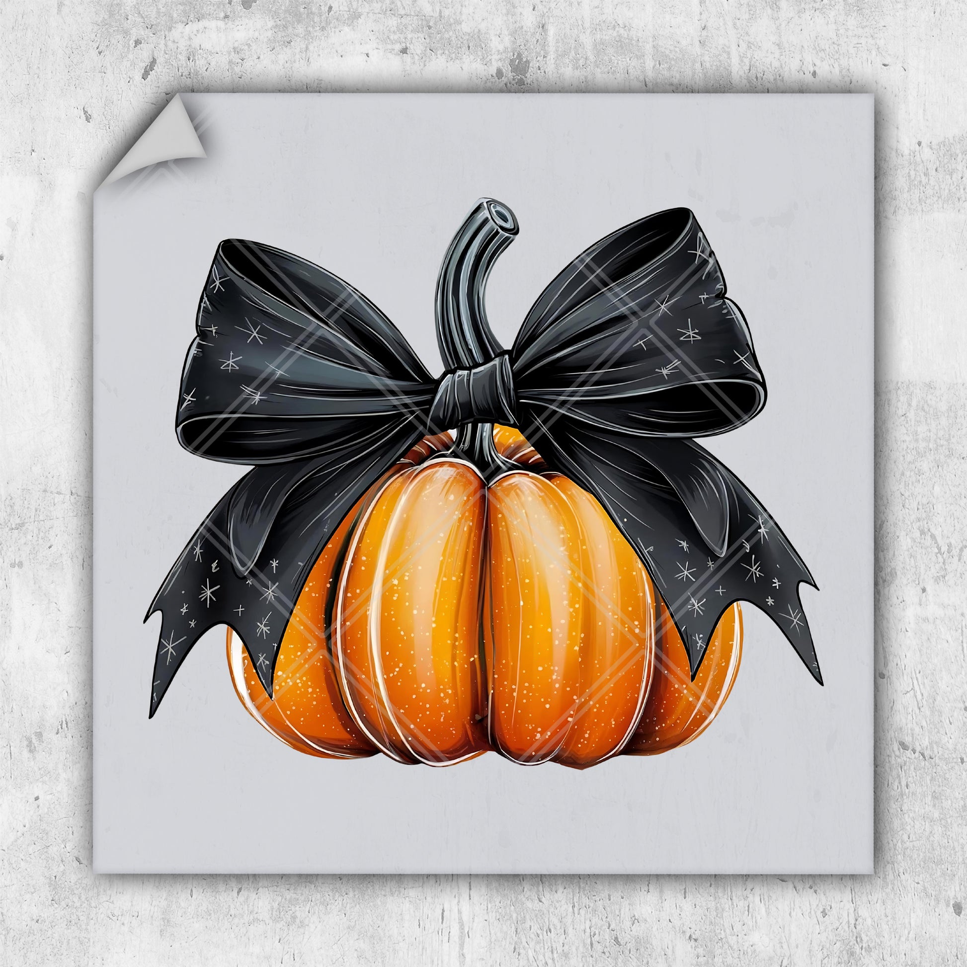 a picture of a pumpkin with a black bow