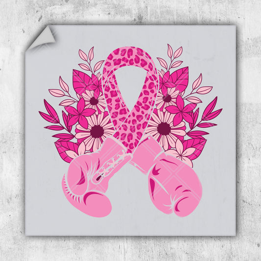 a pink ribbon with boxing gloves and flowers