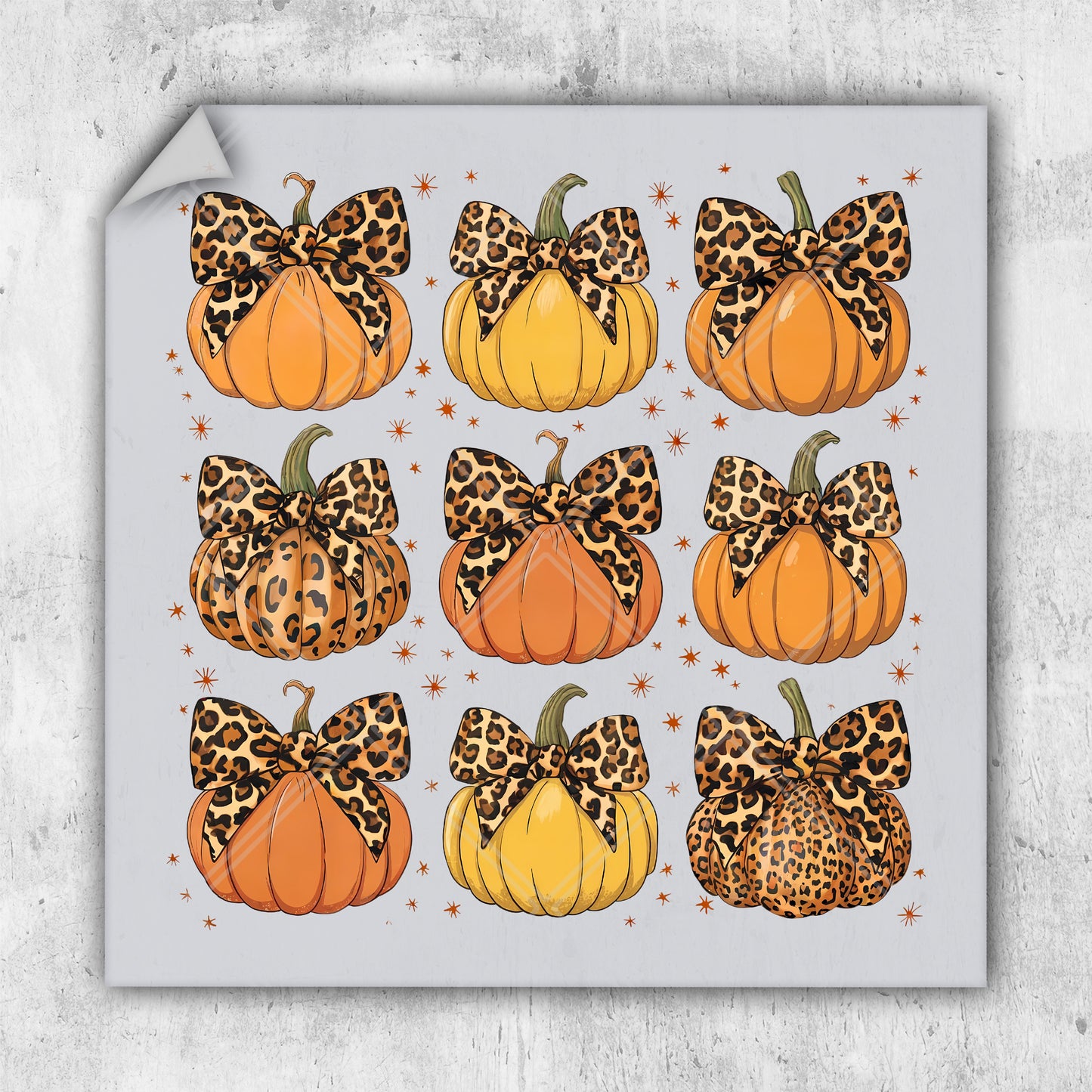 a picture of pumpkins with leopard print bows