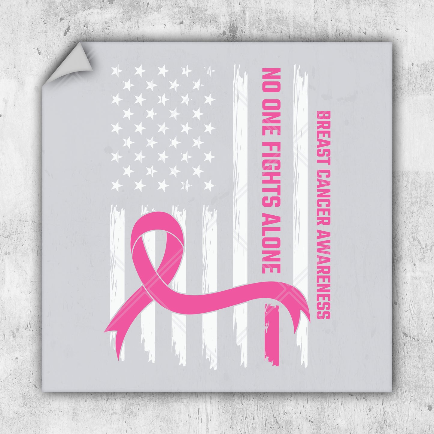 a pink ribbon with the american flag in the background